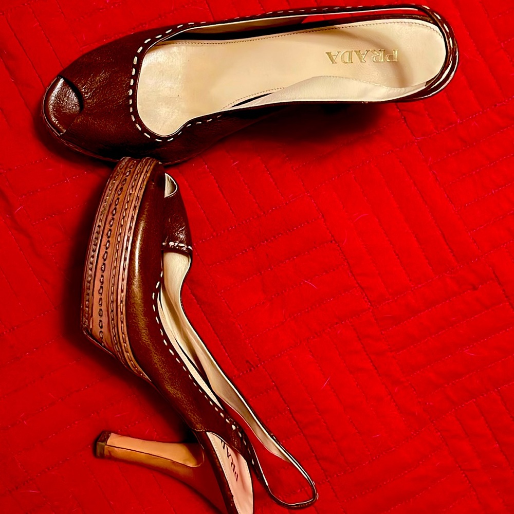 Brown leather, hand stitched Prada sandals.